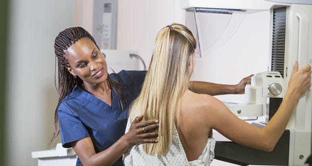 woman getting a mammogram