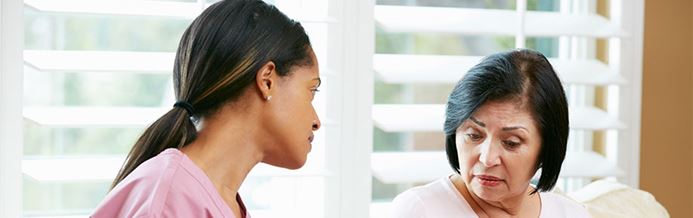 Nurse navigator comforts patient