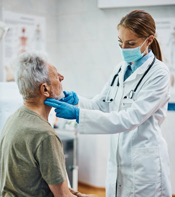 Primary care physician conducts physical and mental exam