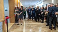 Jill Rowland cuts the ribbon to open the new Interfaith Chapel.
