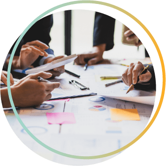 Two hands holding the earth made out of greenery