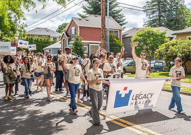 Legacy Health employees walking in the Good in the Hood parade