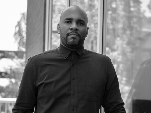 Black and white photo of Tyrell Comeaux