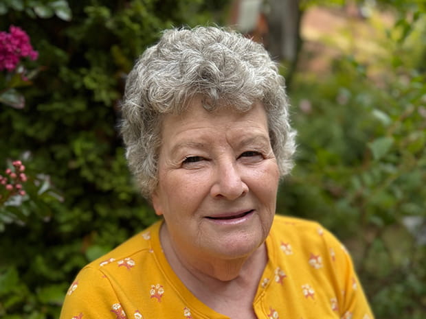 Longest tenured employee stands outside