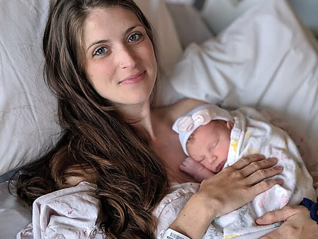 Megan Bass and her baby, born in the pandemic